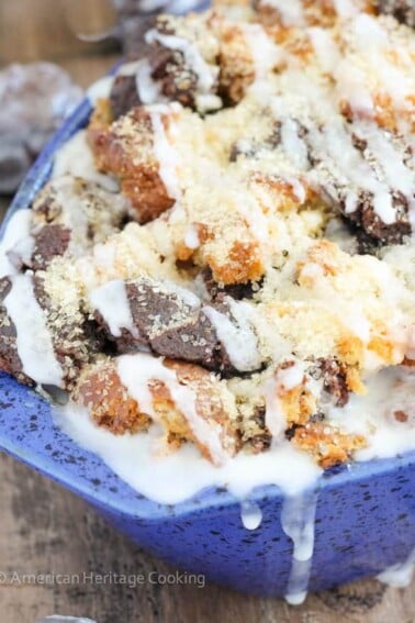 This Coffee Donut Bread Pudding takes everything you love about breakfast and bakes it into one easy dish! Cake donuts baked in a coffee custard for the perfect addition to brunch!