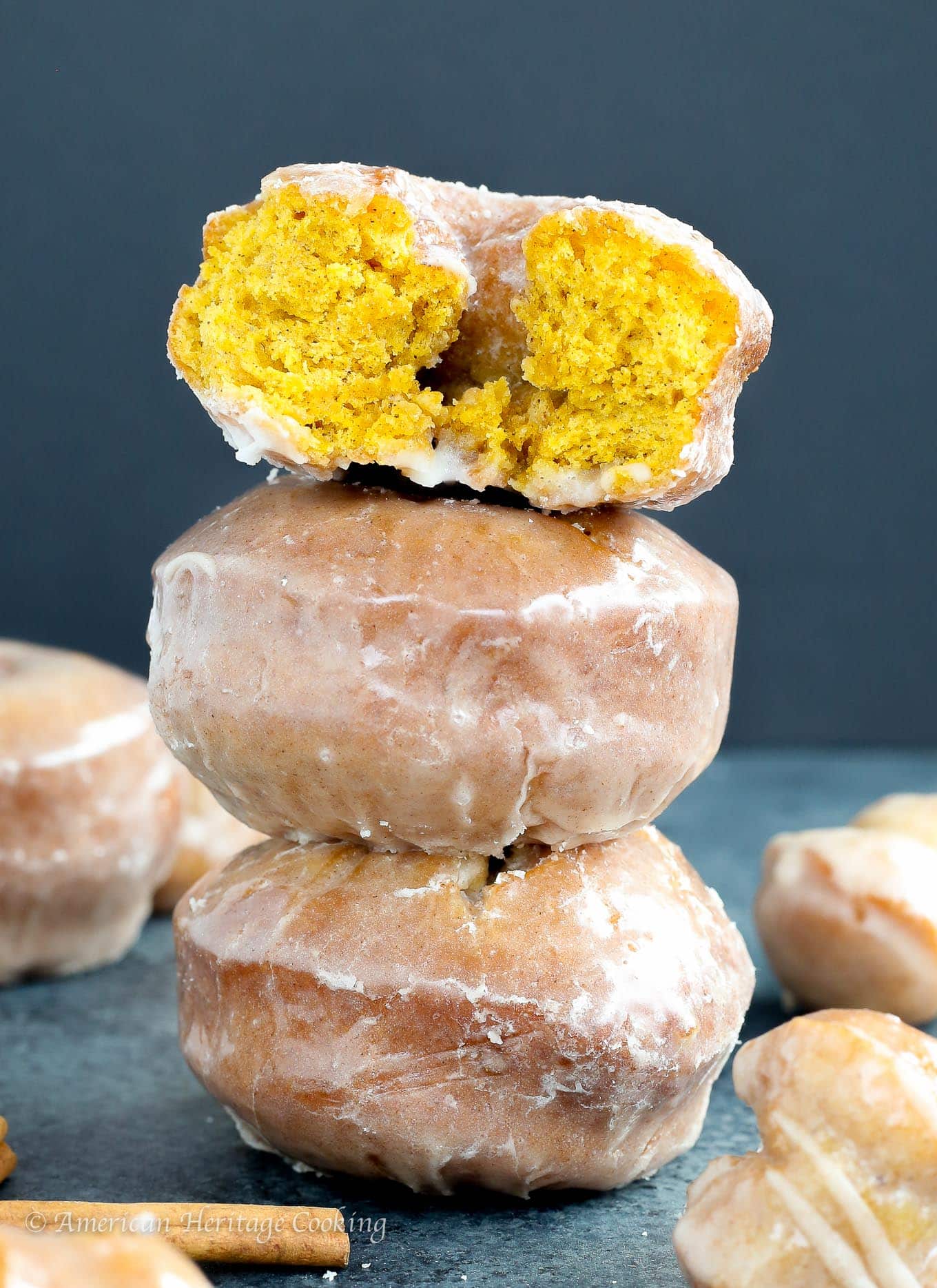 These Pumpkin Spice Cake Donuts are packed with real pumpkin and warming spices then fried to perfection and glazed with a sweet cinnamon sugar. Pretty much Pumpkin Breakfast Perfection. 