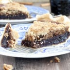 This shoofly pie has all the flavors of a molasses ginger cookie mixed with a buttery streusel in a flakey pastry crust. The rich, spicy, sweet filling just melts in your mouth bite after bite (slice after slice)
