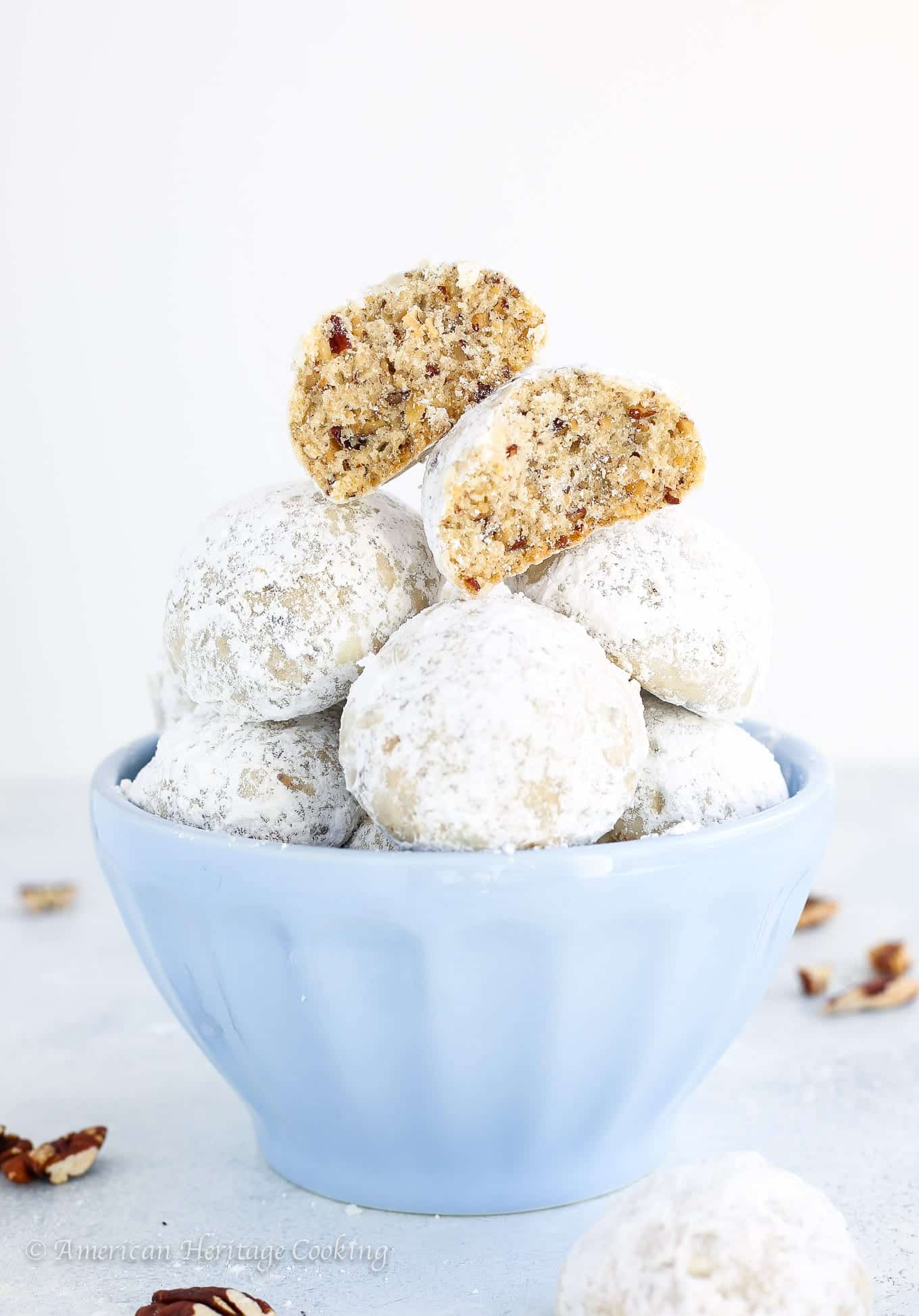 These Pecan Puffs (a.k.a. Mexican Wedding Cookies or Russian Tea Cakes)  are the perfect combination of crumbly and soft. They literally melt in your mouth! 