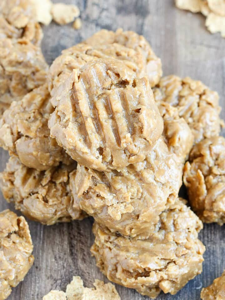 No Bake Peanut Butter Cookies stacked on wooden surface