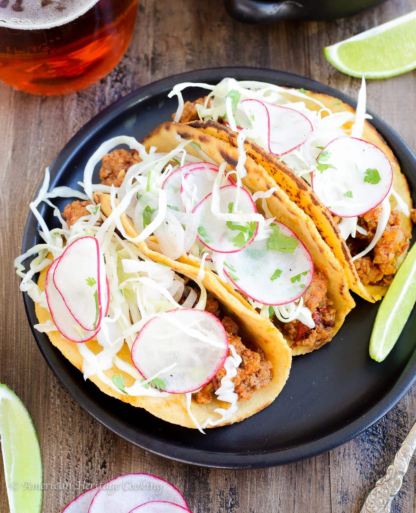 These Chipotle Chorizo Tacos are smoky, spicy and complex! The homemade sweet potato tortilla temper the spice with a little bit of sweetness and a mezcal lime slaw brightens the flavors and pulls the whole taco together! 