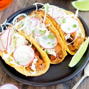 These Chipotle Chorizo Tacos are smoky, spicy and complex! The homemade sweet potato tortilla temper the spice with a little bit of sweetness and a mezcal lime slaw brightens the flavors and pulls the whole taco together!