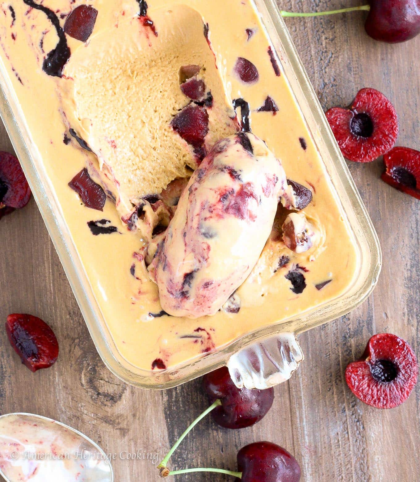 This Bourbon Cherry Caramel Ice Cream is a smooth, rich caramel ice cream with a homemade cherry jam swirl and Bourbon soaked cherries! 