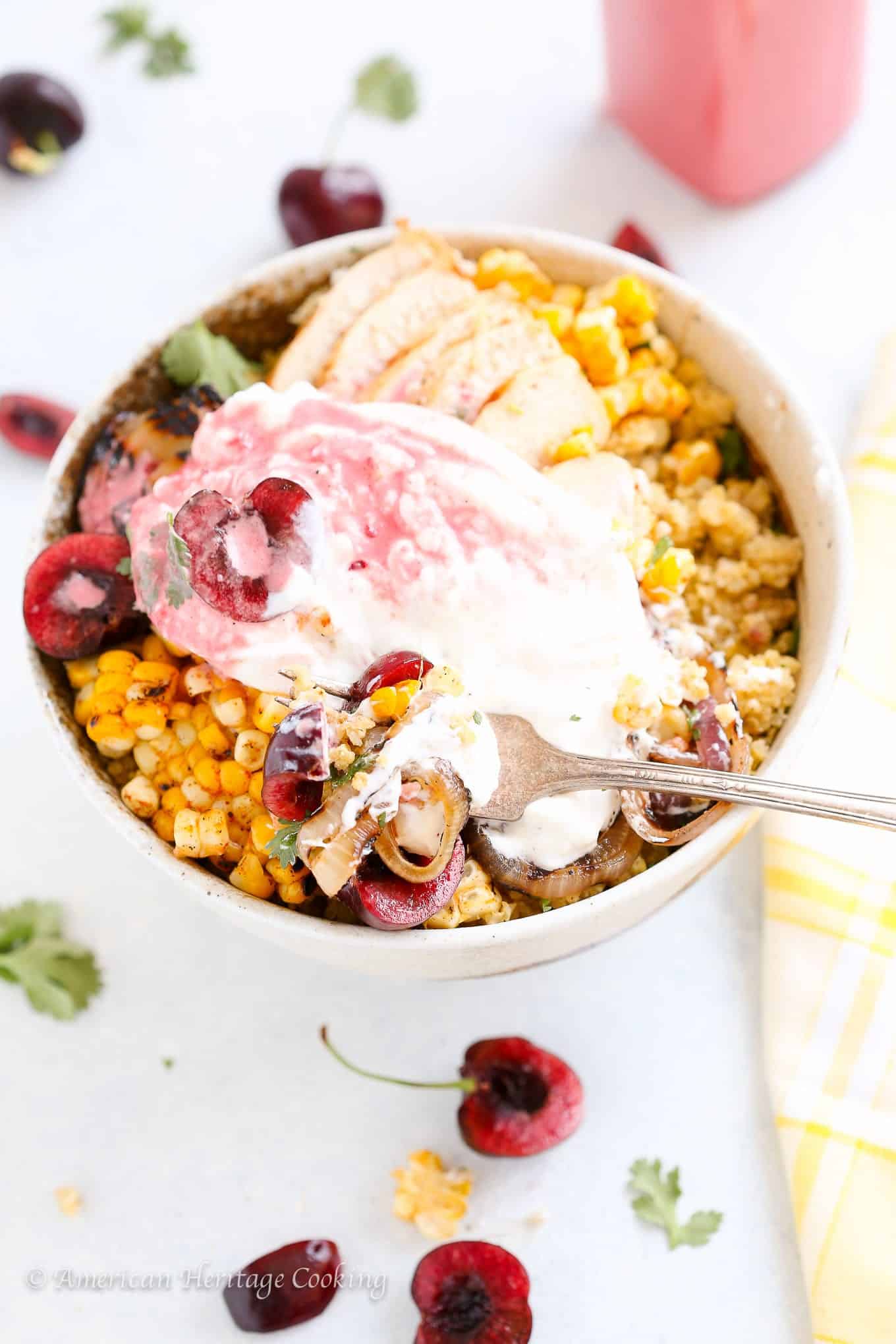 This Cherry Burrata Millet Grain Bowl has nutty millet, grilled red onions, charred shallots, spicy corn, grilled chicken, fresh cherries, creamy Burrata and a bright cherry vinaigrette! It’s the summer bowl to eat on repeat. 