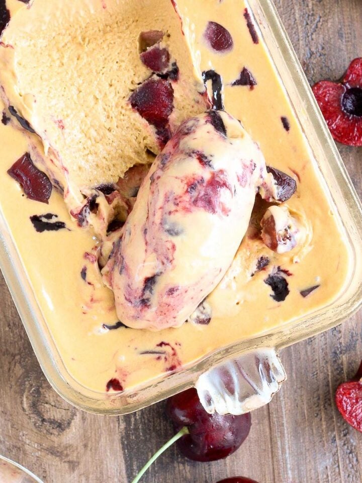 Bourbon Caramel Cherry Ice Cream being scooped with spoon