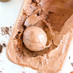 Double Chocolate Caramel Ice Cream in glass container scooped