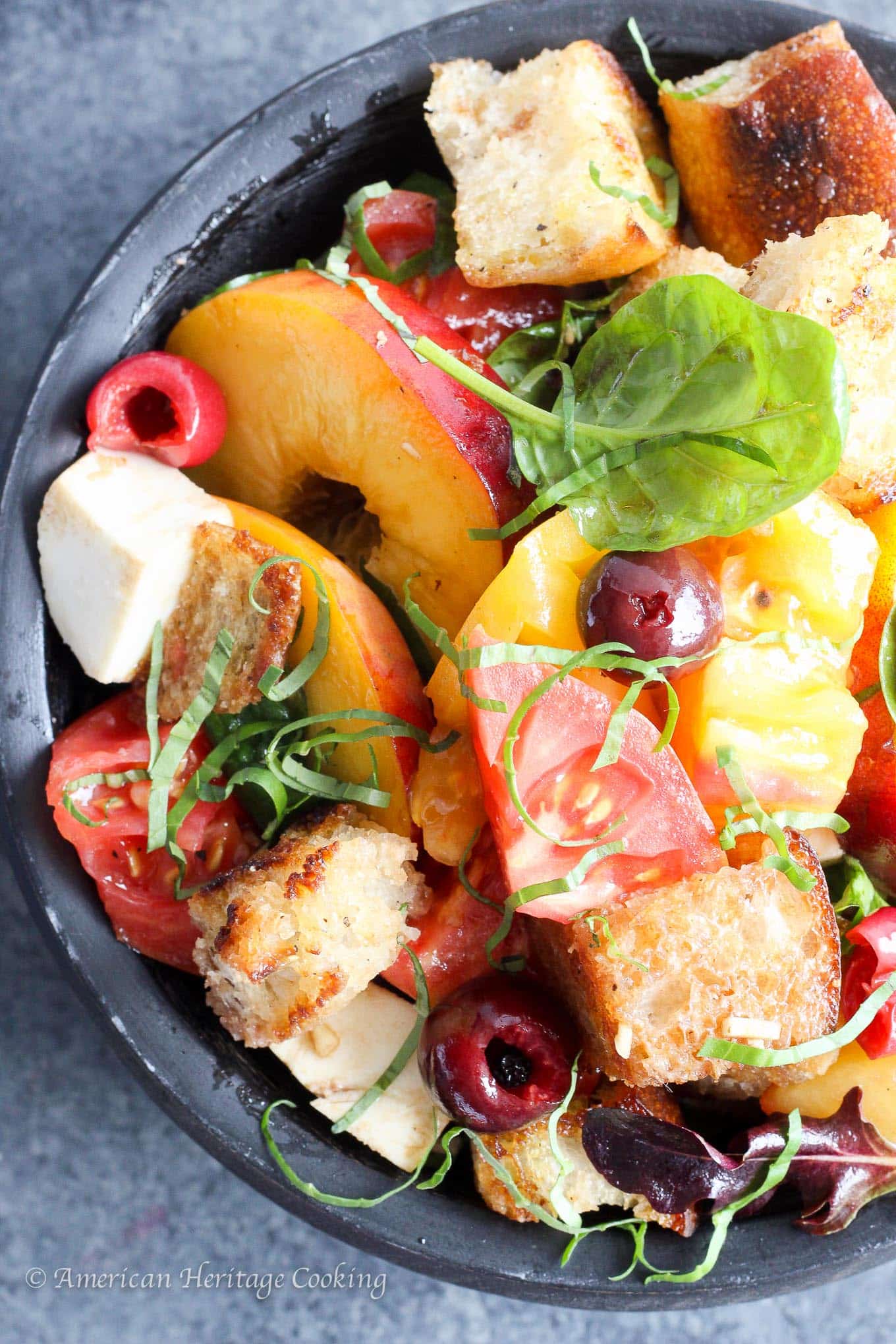 There is nothing better than taking all of Summer’s bounty and throwing it into an easy, no-oven salad! This Stone Fruit Caprese Panzanella Salad is at once familiar and comforting with a hint of the unexpected! 
