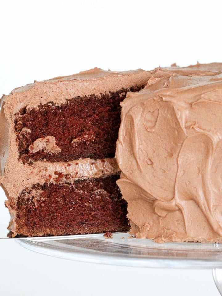 Chocolate Mayonnaise Cake on cake stand sliced