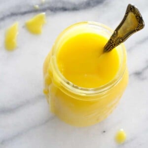 Perfect Lemon Curd in jar with spoon