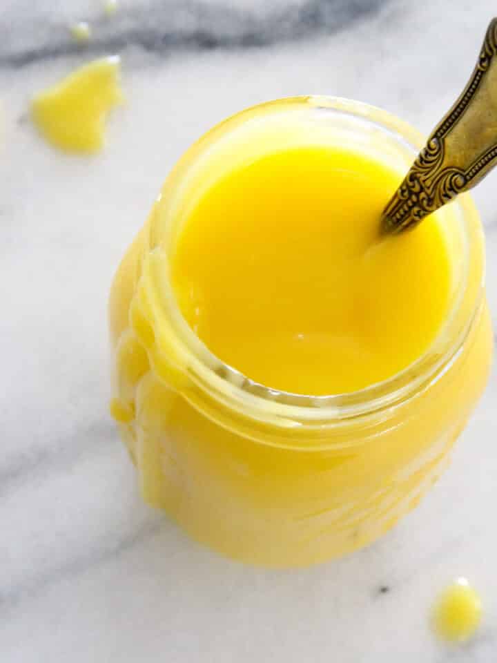 Perfect Lemon Curd in jar with spoon