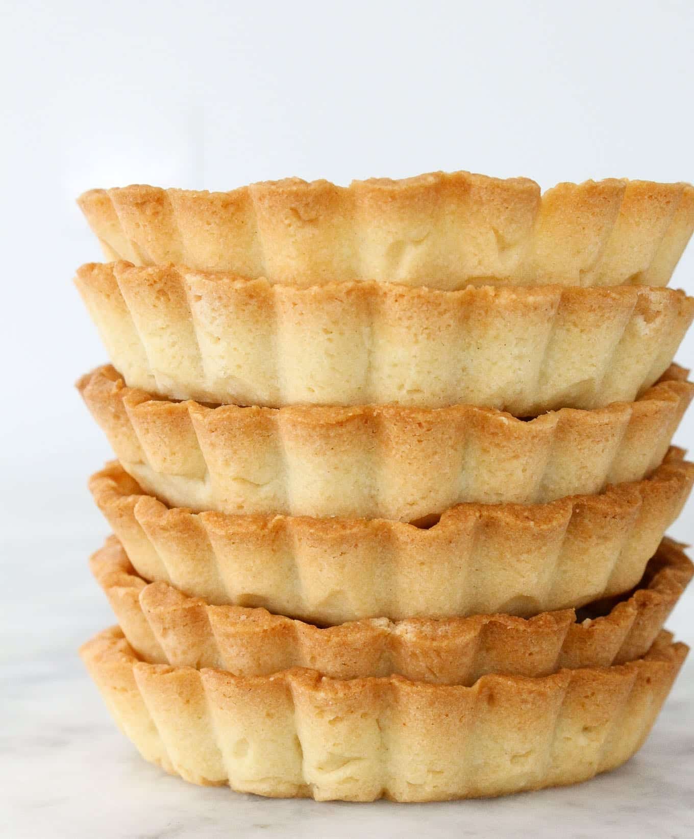 Nutty Almond Tart Foundation 4 Variety of mini tarts made with almond flour crust, filled with fruits and custards.