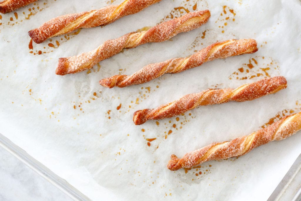 Cinnamon Sugar Twists are an easy dessert you can make with puff pastry scraps! Only three ingredients and you have a delicious dessert!