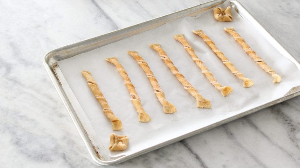 Cinnamon Sugar Twists are an easy dessert you can make with puff pastry scraps! Only three ingredients and you have a delicious dessert!