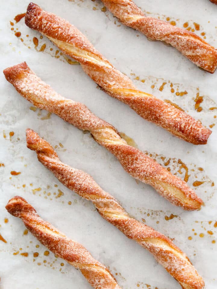 Cinnamon Sugar Twists Baked on Parchment