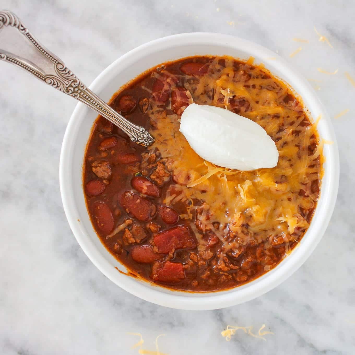 Red chili in a white bowl.
