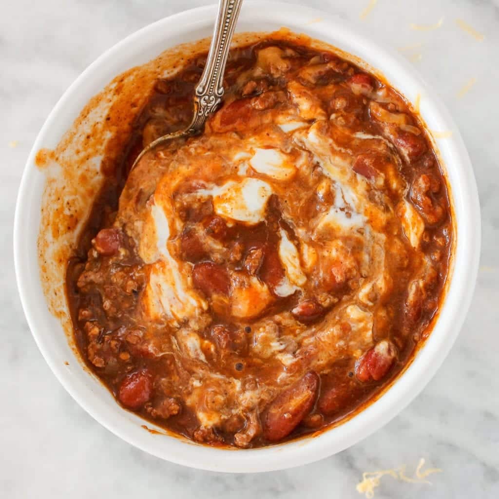The Pinot Noir Chili is a rich, comforting chili with ground beef and kidney beans and just a touch of pinot noir wine for a beautiful depth of flavor! It’s like your favorite chili but dressed up a bit!