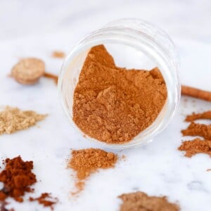 Pumpkin Pie Spice Mix spilling from jar