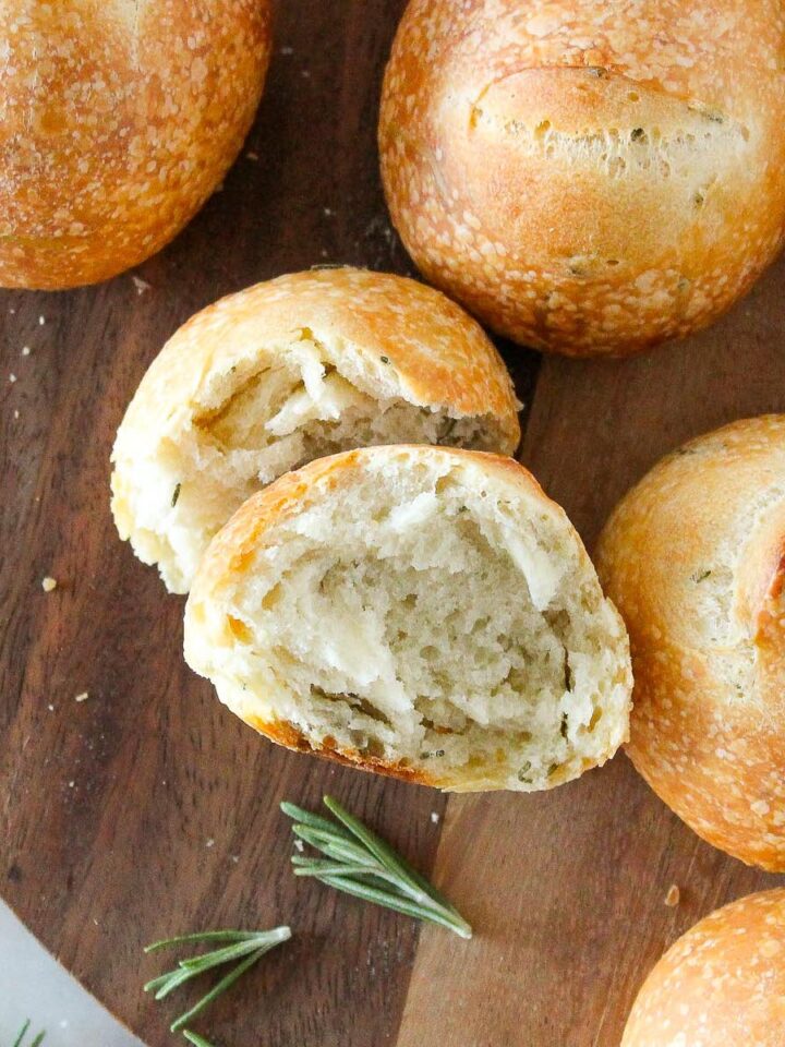 Rosemary Sourdough Rolls on wooden tray
