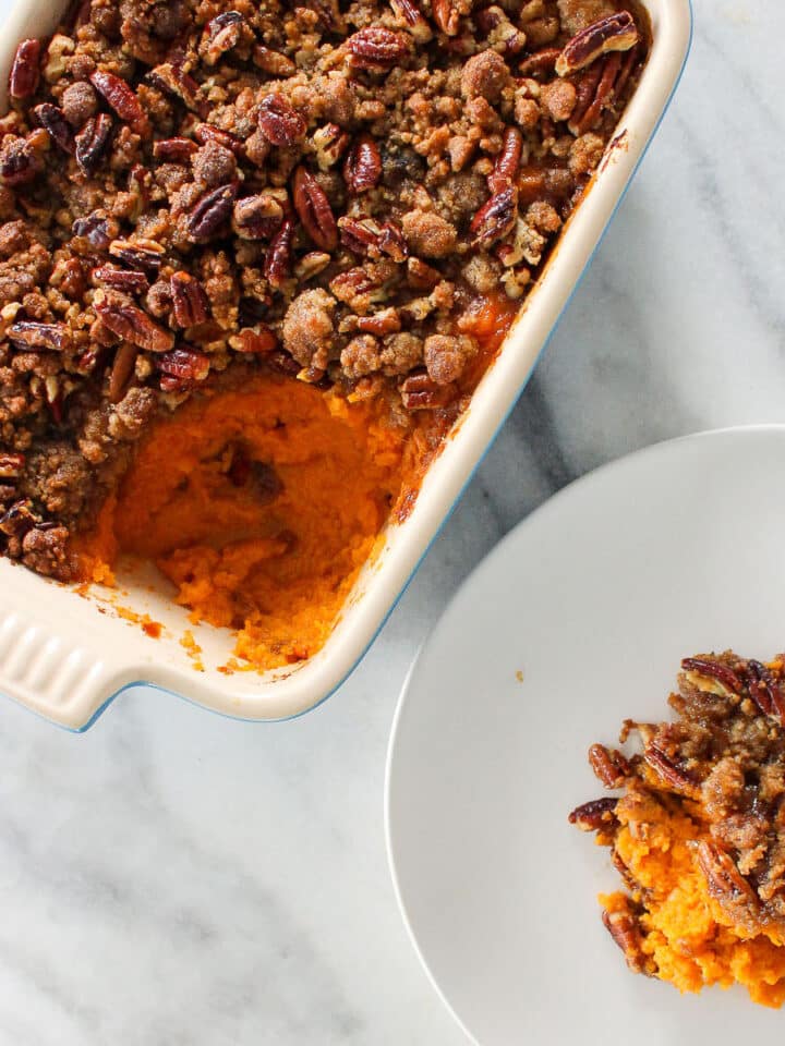 Maple Sweet Potato Casserole in dish and on white plate