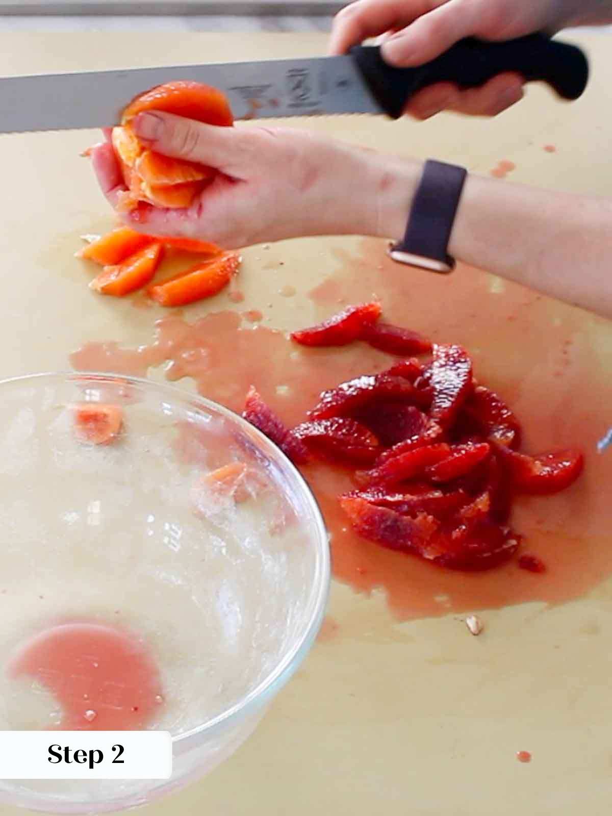 slicing orange supremes.