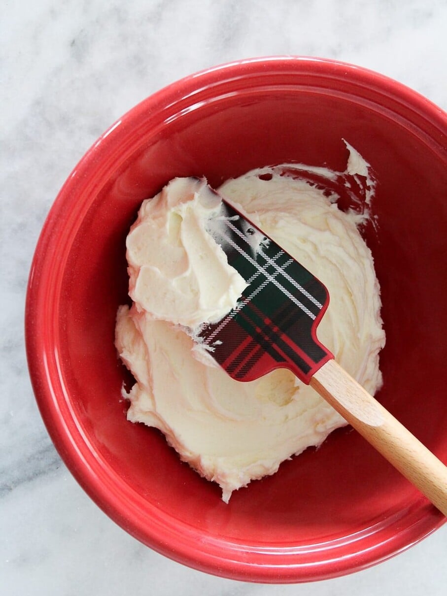 peppermint buttercream in a red glass bowl.