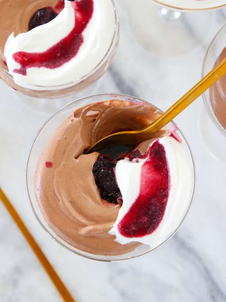Black Forest Mousse in glass with gold spoon