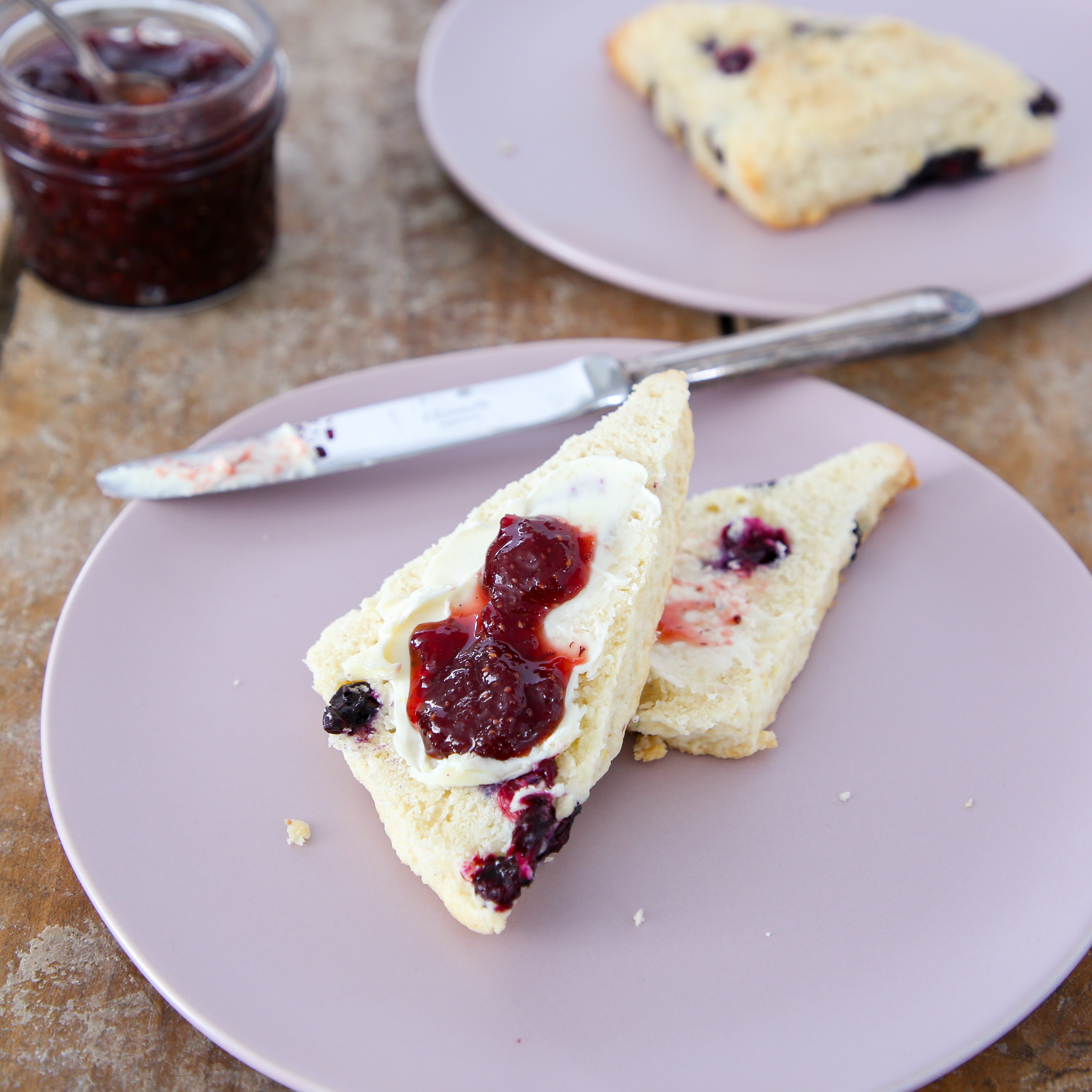 These blueberry scones are soft, tender and moist with the perfect amount of fresh blueberries folded in! A hint of lemon zest rounds out the flavor!