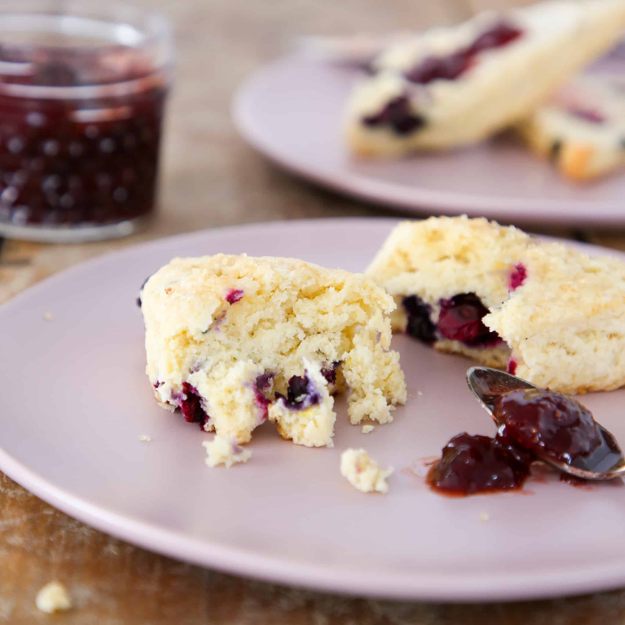 These blueberry scones are soft, tender and moist with the perfect amount of fresh blueberries folded in! A hint of lemon zest rounds out the flavor! 
