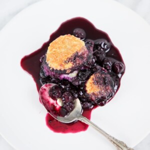 Classic Blueberry Cobbler on white plate