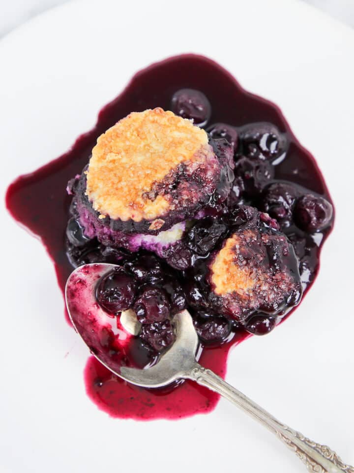 Classic Blueberry Cobbler on white plate