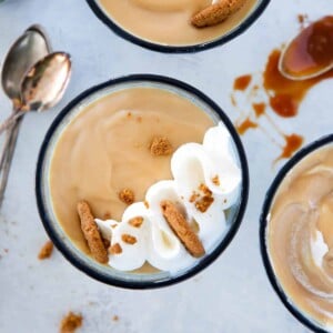 Caramel Pudding in blue glass with whipped cream