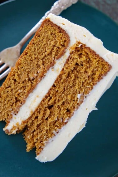Pumpkin Spice Layer Cake slice on plate.