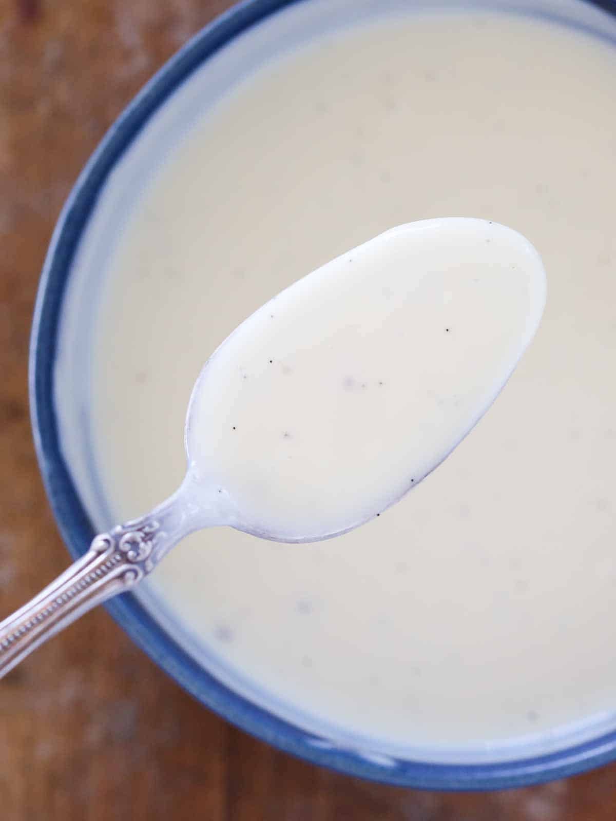 vanilla anglaise in blue bowl.