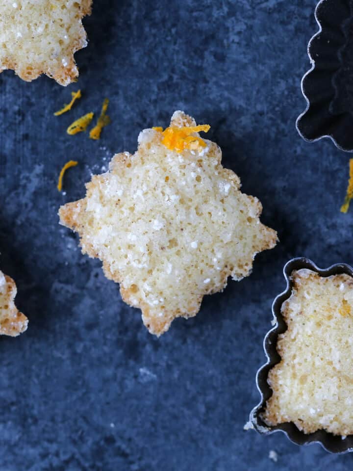 Orange Financiers on blue surface