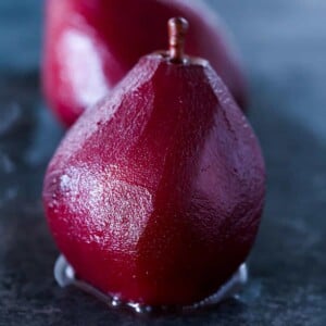 Red Wine Poached Pear from front served for Valentine's Day Desserts.