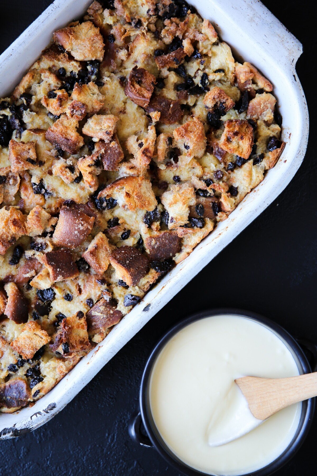 bread pudding baked in vintage metal serving dish. 