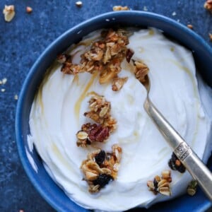 Honey Granola on yogurt in blue bowl