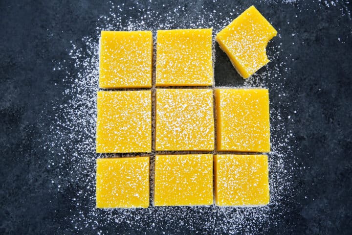 Lemon Bars cut on black board