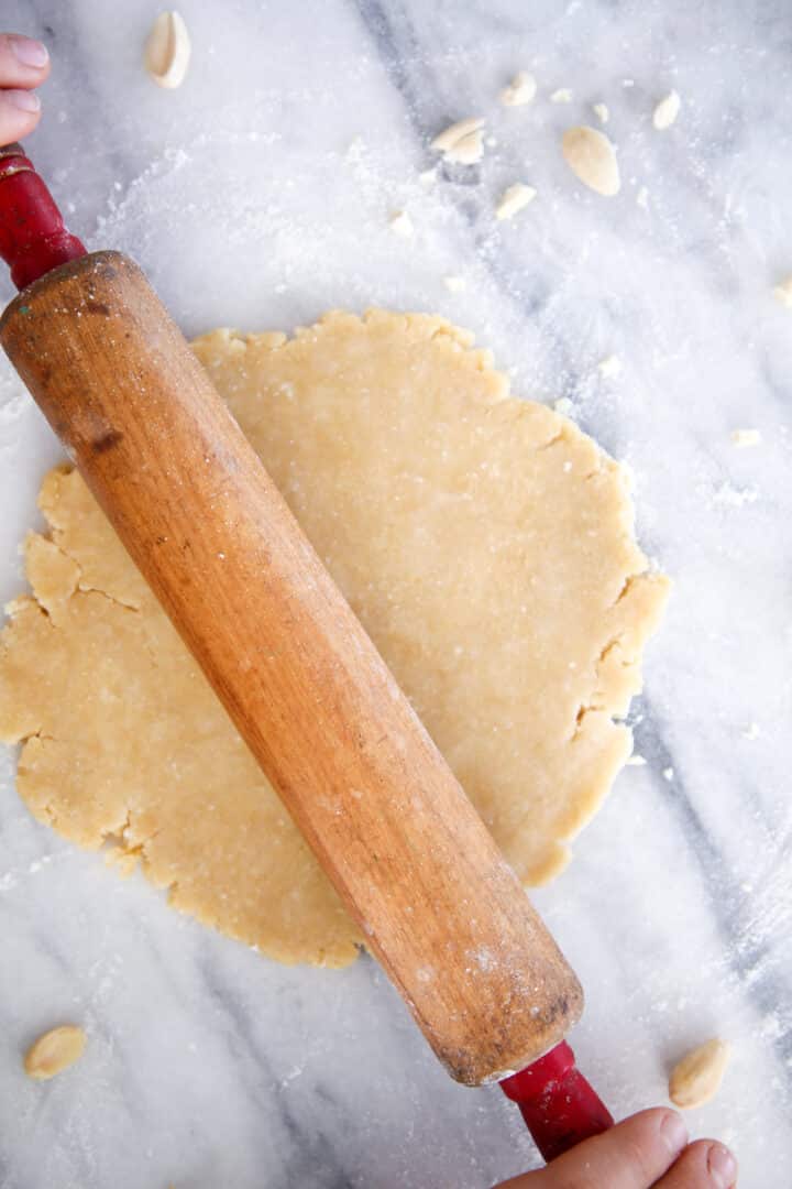 Old Fashioned Almond Pie Crust dough on marble surface