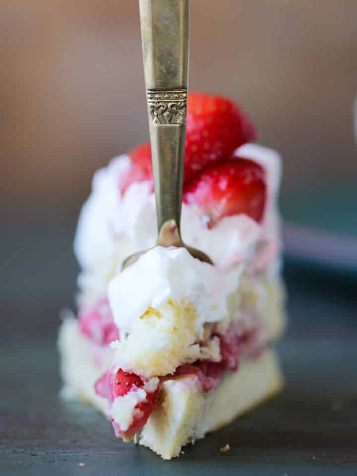 Old Fashioned Strawberry Shortcake slice close up with gold fork