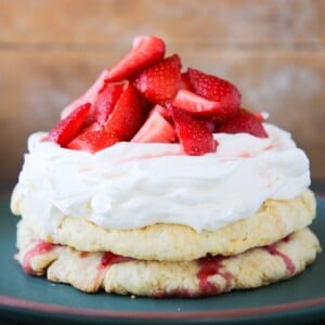 Old Fashioned Strawberry Shortcake unsliced on green plate