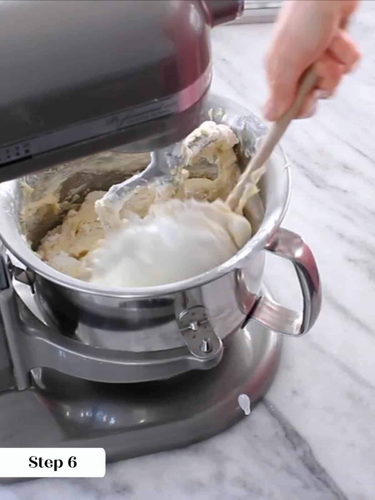 mixing the moist yellow cake batter in stand mixer.