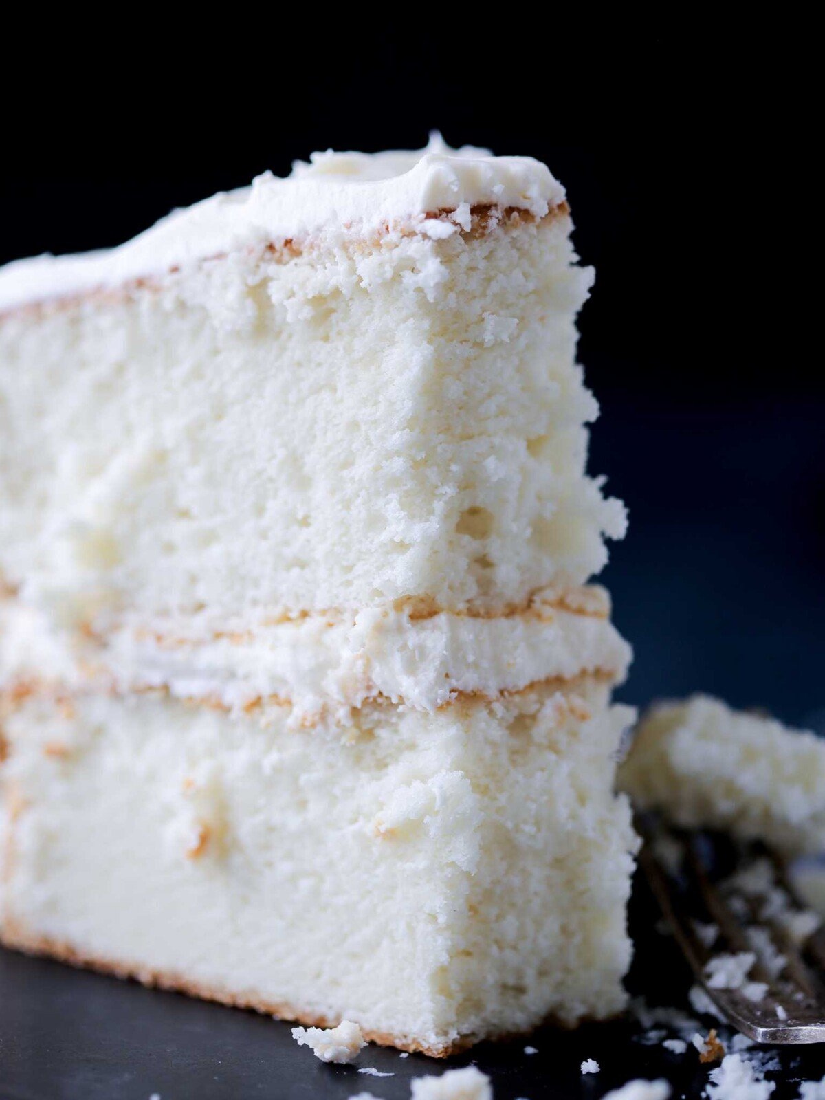 white cake slice with fluffy inside.