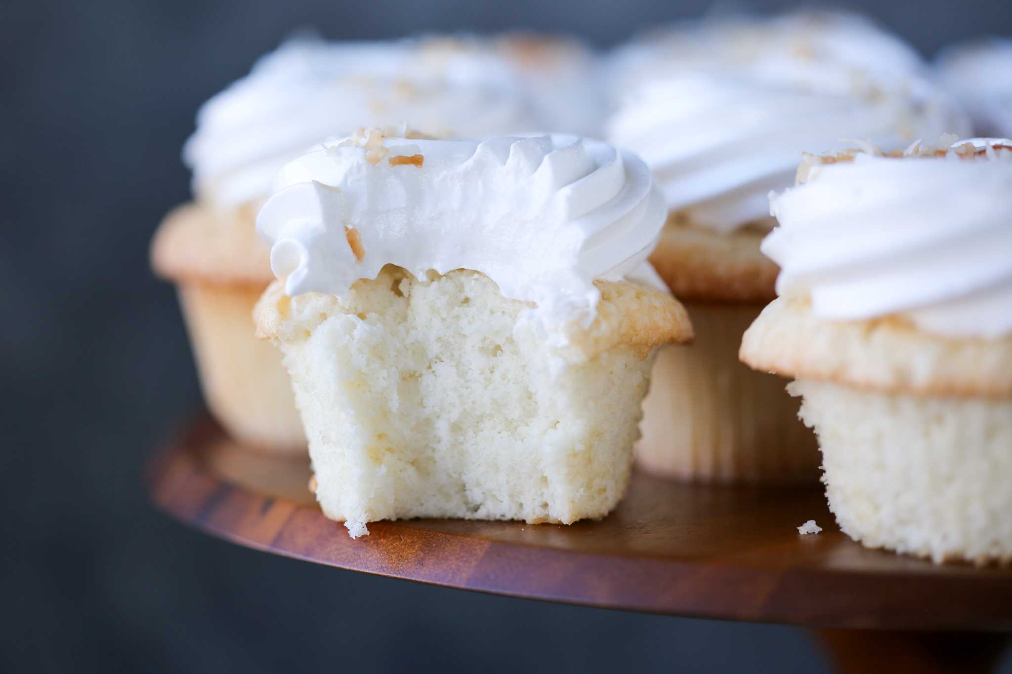 Coconut Cupcakes Fluffy White Frosting Sideview
