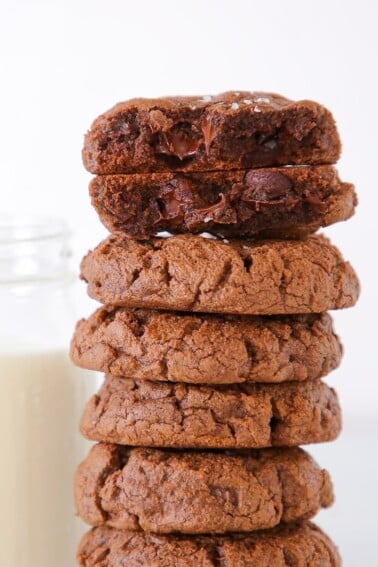 Triple Chocolate Chip Cookies Stacked next to milk