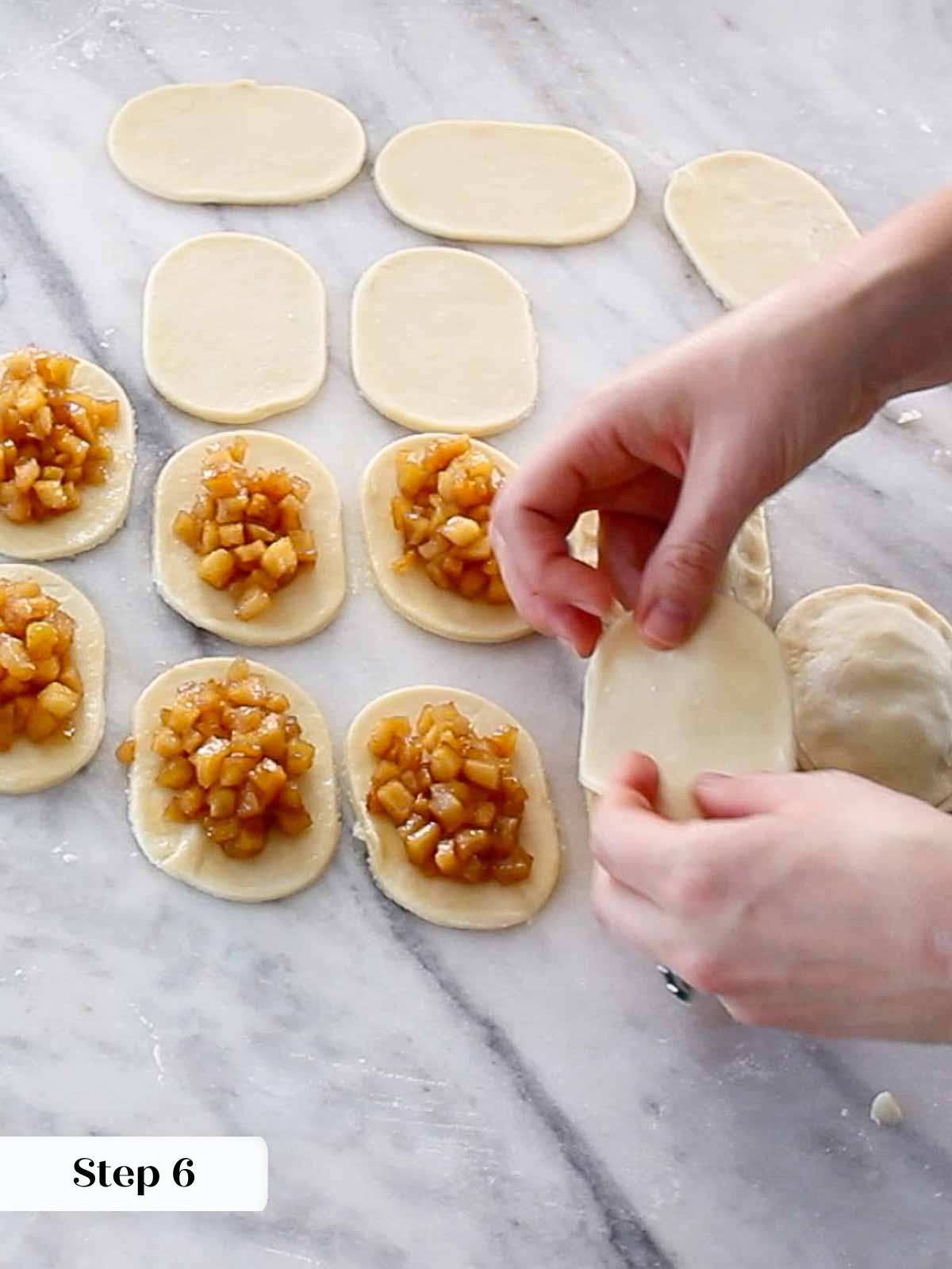 assembling apple hand pies.
