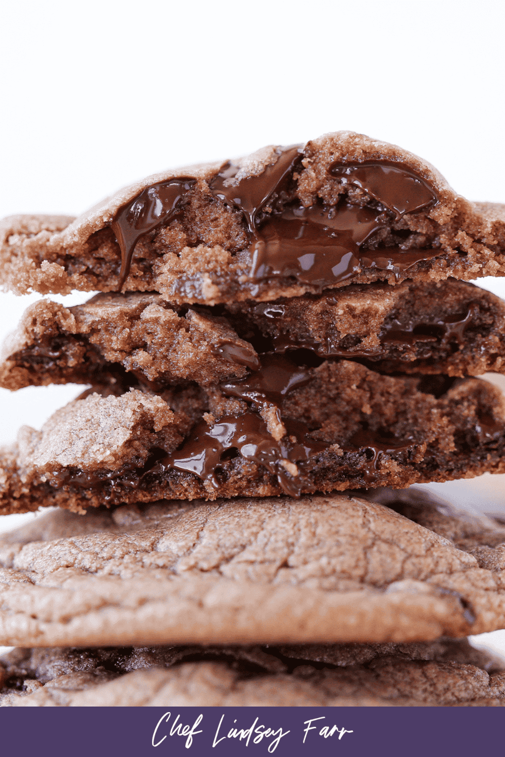 Nutella cookies stacked showing the gooey chocolate inside.