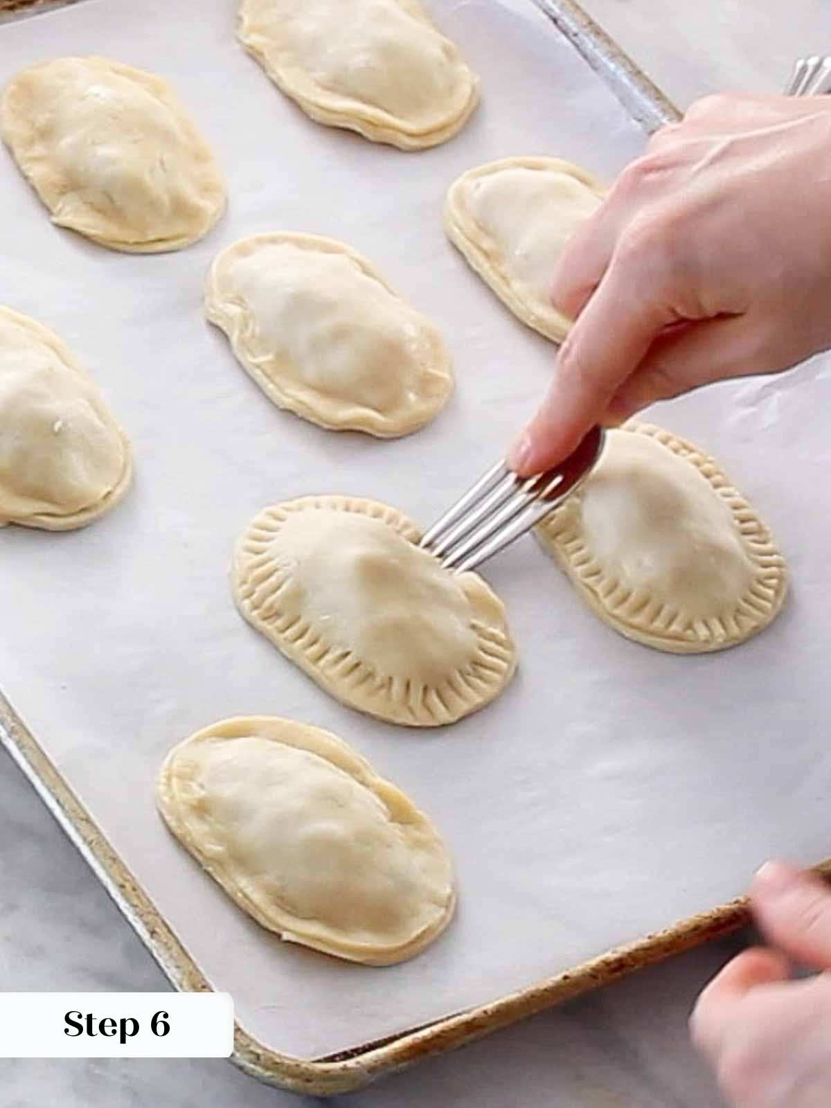 sealing hand pies with fork.