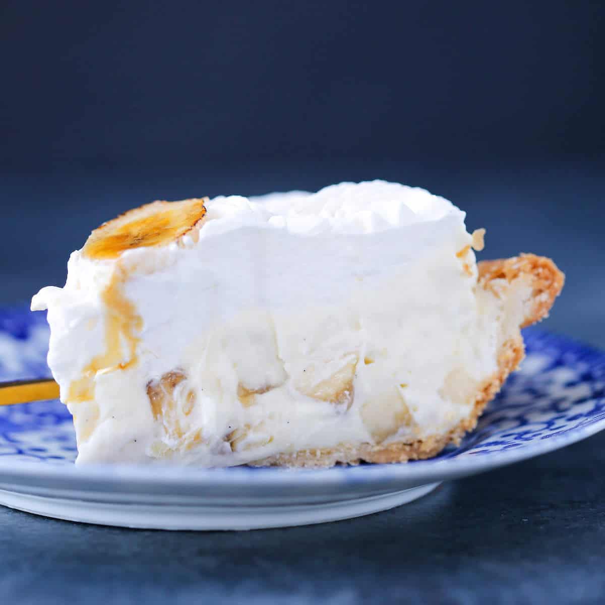 Banana Cream Pie slice on blue plate